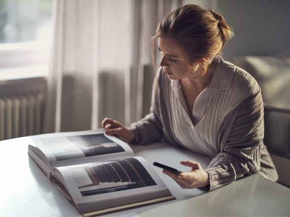 Woman reading a dictionary