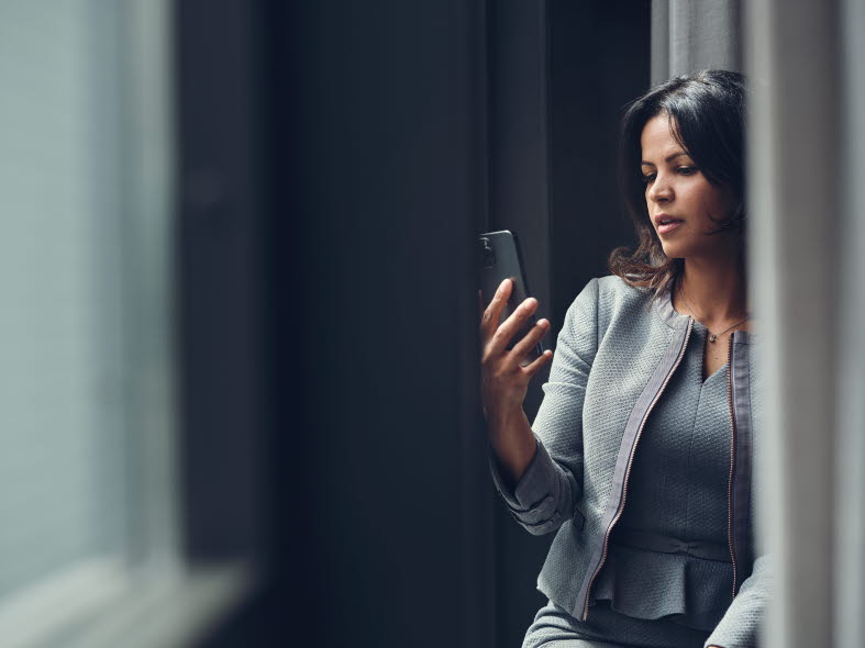Woman looking at her mobile phone